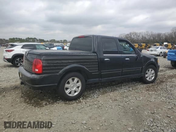 ✅ 2002 Lincoln Blackwood • VIN: 5LTEW05A72KJ01109 • Lot: 44192655. Listed on Copart with Not provided. Free auction sales archive from the USA and detailed vehicle history report at DreamBid. Image 3.