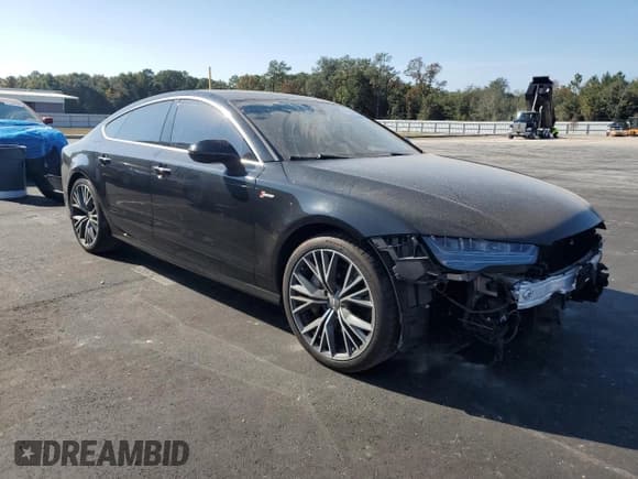 ✅ 2018 Audi A7 Prestige • VIN: WAU23AFCXJN071733 • Лот: 93404725. Опубликован ранее на Copart с пробегом 104 245 миль. Бесплатный доступ к архиву аукционных продаж из США и подробный отчёт об истории автомобиля на DreamBid. Изображение 4.
