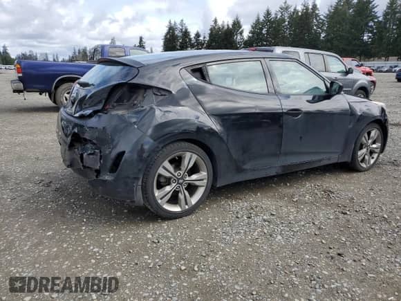2013 Hyundai Veloster w/Gray Int z VIN KMHTC6AD5DU111338, wystawiony jako Copart lot #51661435 z przebiegiem 55 560 mil mil oraz Szkoda całkowita • Salvage title. Historia ofert i sprzedaży dostępna na DreamBid. Obrazek 3.