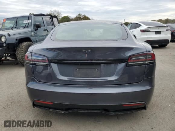 ✅ 2022 Tesla Model S • VIN: 5YJSA1E52NF480647 • Лот: 86312665. Опубликован ранее на Copart с пробегом 51 865 миль. Бесплатный доступ к архиву аукционных продаж из США и подробный отчёт об истории автомобиля на DreamBid. Изображение 6.