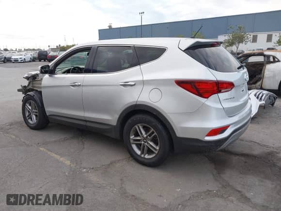 ✅ 2018 Hyundai Santa Fe 2.4L • VIN: 5XYZT3LB6JG571999 • Lot: 43406406. Wystawiony na IAAI z przebiegiem 104 647 mil. Bezpłatny archiwum sprzedaży aukcyjnych z USA i szczegółowy raport historii pojazdu na DreamBid. Zdjęcie 3.