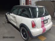 ✅ 2006 MINI Hardtop • VIN: WMWRC33506TK15034 • Lot: 42349957. Listed on IAAI with 153,596 mi. Free auction sales archive from the USA and detailed vehicle history report at DreamBid. Image 3.