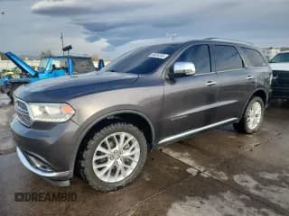 ✅ 2014 Dodge Durango Citadel • VIN: 1C4RDJEG9EC306997 • Lot: 90824345. Listed on Copart with 144,051 mi. Free auction sales archive from the USA and detailed vehicle history report at DreamBid. Image 1.