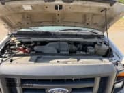 ✅ 2010 Ford Econoline Cargo Commercial • VIN: 1FTNE1EW6ADA36473 • Lot: 55557795. Wystawiony na Copart z przebiegiem 476 354 mil. Bezpłatny archiwum sprzedaży aukcyjnych z USA i szczegółowy raport historii pojazdu na DreamBid. Zdjęcie 7.