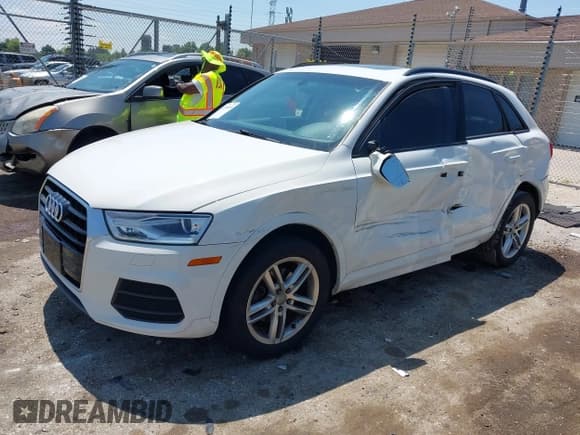 ✅ 2017 Audi Q3 Premium • VIN: WA1BCCFS7HR009192 • Lot: 42734919. Listed on IAAI with 100,100 mi. Free auction sales archive from the USA and detailed vehicle history report at DreamBid. Image 2.