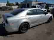 2011 Chevrolet Malibu 1LS z VIN 1G1ZB5E15BF323713, wystawiony jako Copart lot #69056474 z przebiegiem 144 483 mil mil oraz Szkoda całkowita • Salvage title. Historia ofert i sprzedaży dostępna na DreamBid. Obrazek 3.