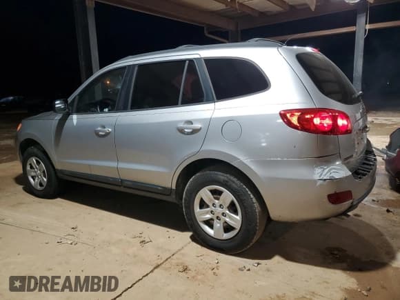 ✅ 2009 Hyundai Santa Fe GLS • VIN: 5NMSG13D79H250860 • Lot: 84526564. Listed on Copart with 200,602 mi. Free auction sales archive from the USA and detailed vehicle history report at DreamBid. Image 2.