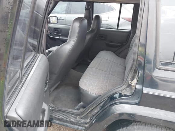 ✅ 1999 Jeep Cherokee Sport • VIN: 1J4FT68SXXL543773 • Lot: 43750806. Listed on IAAI with 248,224 mi. Free auction sales archive from the USA and detailed vehicle history report at DreamBid. Image 8.