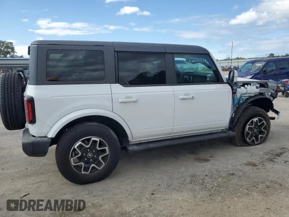 ✅ 2024 Ford Bronco Outer Banks • VIN: 1FMDE8BH5RLB37219 • Лот: 84535835. Опубликован ранее на Copart с пробегом 7 393 миль. Бесплатный доступ к архиву аукционных продаж из США и подробный отчёт об истории автомобиля на DreamBid. Изображение 3.