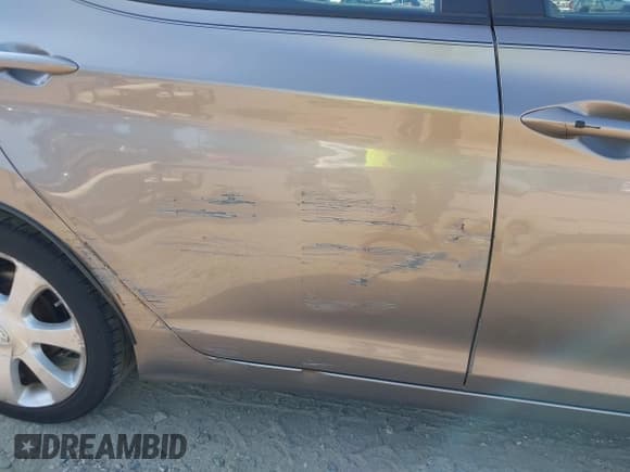 ✅ 2013 Hyundai Elantra GLS • VIN: 5NPDH4AE3DH240275 • Lot: 42819323. Listed on IAAI with 143,276 mi. Free auction sales archive from the USA and detailed vehicle history report at DreamBid. Image 6.