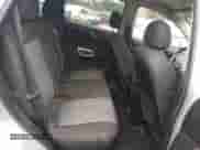 2013 Chevrolet Captiva Sport LS z VIN 3GNAL2EKXDS601276, wystawiony jako Copart lot #84032744 z przebiegiem 145 571 mil mil oraz Czysty tytuł • Clean title. Historia ofert i sprzedaży dostępna na DreamBid. Obrazek 11.