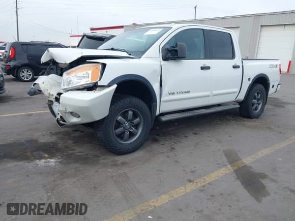 ✅ 2014 Nissan Titan Pro-4X • VIN: 1N6BA0ECXEN501915 • Lot: 42097967. Wystawiony na IAAI z przebiegiem 120 851 mil. Bezpłatny archiwum sprzedaży aukcyjnych z USA i szczegółowy raport historii pojazdu na DreamBid. Zdjęcie 2.