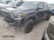 ✅ 2022 Toyota Tacoma TRD Off Road • VIN: 3TYCZ5AN4NT102713 • Лот: 90755245. Опубликован ранее на Copart с пробегом 35 873 миль. Бесплатный доступ к архиву аукционных продаж из США и подробный отчёт об истории автомобиля на DreamBid. Изображение 1.