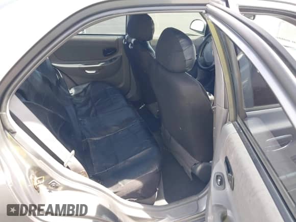 2003 Hyundai Accent GL with VIN KMHCG45C73U471607, listed as a IAAI auction lot 41956551 with 222,305 mi miles and . Bid and sale history available at DreamBid. Image 8.