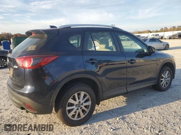 ✅ 2014 Mazda CX-5 Sport • VIN: JM3KE2BE5E0421774 • Lot: 92990745. Wystawiony na Copart z przebiegiem 259 399 mil. Bezpłatny archiwum sprzedaży aukcyjnych z USA i szczegółowy raport historii pojazdu na DreamBid. Zdjęcie 3.