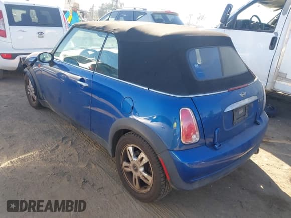 ✅ 2006 MINI Convertible • VIN: WMWRF33576TG14873 • Lot: 43592857. Listed on IAAI with 104,184 mi. Free auction sales archive from the USA and detailed vehicle history report at DreamBid. Image 3.