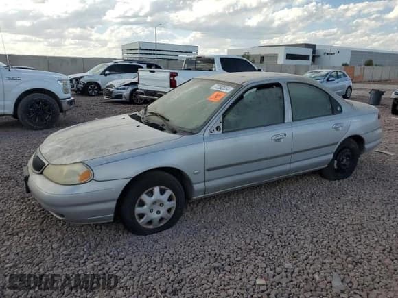 ✅ 1998 Mercury Mystique GS • VIN: 1MEFM6530WK662855 • Лот: 62407575. Опубликован ранее на Copart с пробегом 135 987 миль. Бесплатный доступ к архиву аукционных продаж из США и подробный отчёт об истории автомобиля на DreamBid. Изображение 1.