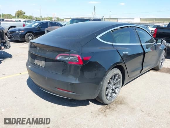✅ 2019 Tesla Model 3 Mid Range • VIN: 5YJ3E1EA2KF395261 • Lot: 43400329. Listed on IAAI with 113,981 mi. Free auction sales archive from the USA and detailed vehicle history report at DreamBid. Image 4.