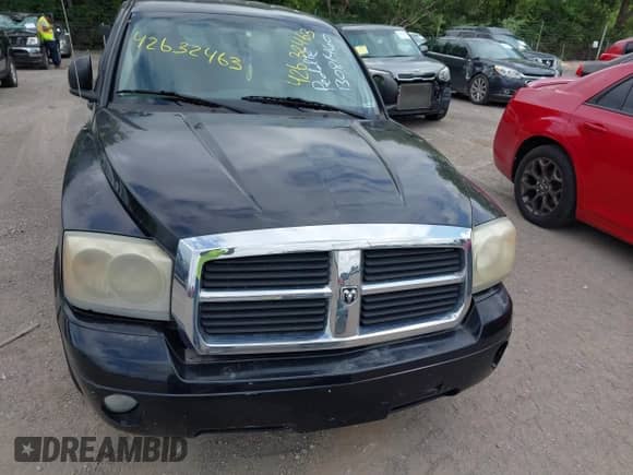 2005 Dodge Dakota Laramie with VIN 1D7HW58N55S161413, listed as a IAAI auction lot 42632463 with 144,000 mi miles and . Bid and sale history available at DreamBid. Image 13.