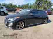 2013 Hyundai Veloster Turbo z VIN KMHTC6AE7DU166690, wystawiony jako Copart lot #70153245 z przebiegiem 206 496 mil mil oraz Czysty tytuł • Clean title. Historia ofert i sprzedaży dostępna na DreamBid. Obrazek 1.