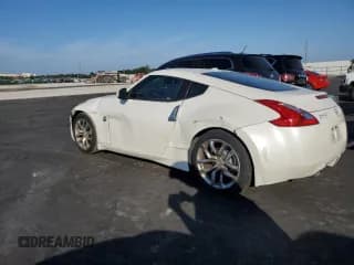 ✅ 2013 Nissan 370Z • VIN: JN1AZ4EH0DM382077 • Lot: 93843355. Wystawiony na Copart z przebiegiem 53 514 mil. Bezpłatny archiwum sprzedaży aukcyjnych z USA i szczegółowy raport historii pojazdu na DreamBid. Zdjęcie 2.