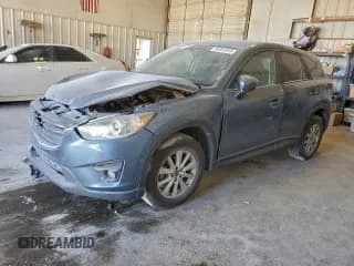 ✅ 2016 Mazda CX-5 Touring • VIN: JM3KE4CY5G0673256 • Lot: 95955555. Listed on Copart with 131,653 mi. Free auction sales archive from the USA and detailed vehicle history report at DreamBid. Image 1.