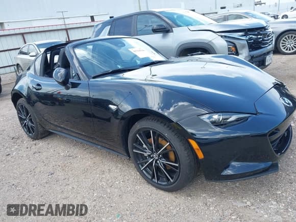 ✅ 2025 Mazda MX-5 Miata Grand Touring • VIN: JM1NDAM7XS0653445 • Лот: 42754768. Опубликован ранее на IAAI с пробегом Не указан. Бесплатный доступ к архиву аукционных продаж из США и подробный отчёт об истории автомобиля на DreamBid. Изображение 1.