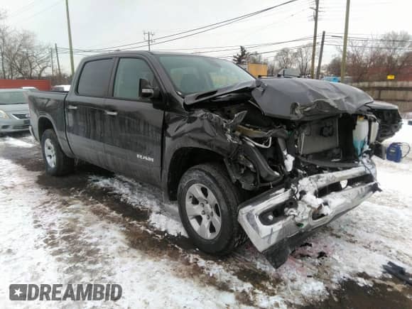 2019 Ram 1500 Big Horn z VIN 1C6RRFFG2KN904627, wystawiony jako IAAI lot #41581062 z przebiegiem 54 840 mil mil oraz . Historia ofert i sprzedaży dostępna na DreamBid. Obrazek 1.