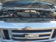 ✅ 2014 Ford Econoline Cargo Commercial • VIN: 1FTNE2EW5EDA53891 • Lot: 67302725. Listed on Copart with 116,432 mi. Free auction sales archive from the USA and detailed vehicle history report at DreamBid. Image 12.