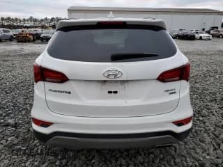 ✅ 2017 Hyundai Santa Fe 2.4L • VIN: 5XYZUDLB3HG382451 • Лот: 40291464. Опубликован ранее на Copart с пробегом 86 060 миль. Бесплатный доступ к архиву аукционных продаж из США и подробный отчёт об истории автомобиля на DreamBid. Изображение 6.