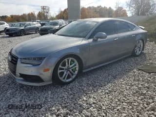 ✅ 2016 Audi S7 • VIN: WAUW2AFC5GN105817 • Lot: 76579934. Listed on Copart with 112,894 mi. Free auction sales archive from the USA and detailed vehicle history report at DreamBid. Image 1.