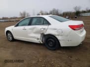 ✅ 2012 Lincoln MKZ • VIN: 3LNHL2JC6CR805161 • Lot: 93354085. Listed on Copart with 148,010 mi. Free auction sales archive from the USA and detailed vehicle history report at DreamBid. Image 2.