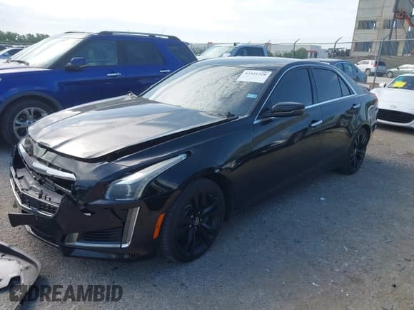 ✅ 2014 Cadillac CTS Vsport RWD • VIN: 1G6AU5S80E0157000 • Lot: 42421328. Listed on IAAI with 130,953 mi. Free auction sales archive from the USA and detailed vehicle history report at DreamBid. Image 2.