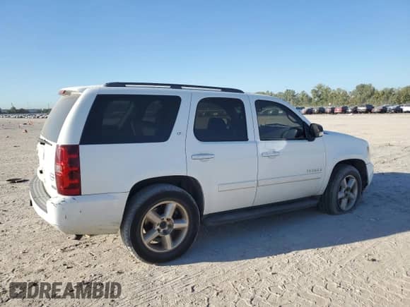 2008 Chevrolet Tahoe 2LT with VIN 1GNFC13048R268387, listed as a Copart auction lot 87075985 with 215,039 mi miles and Salvage title. Bid and sale history available at DreamBid. Image 3.