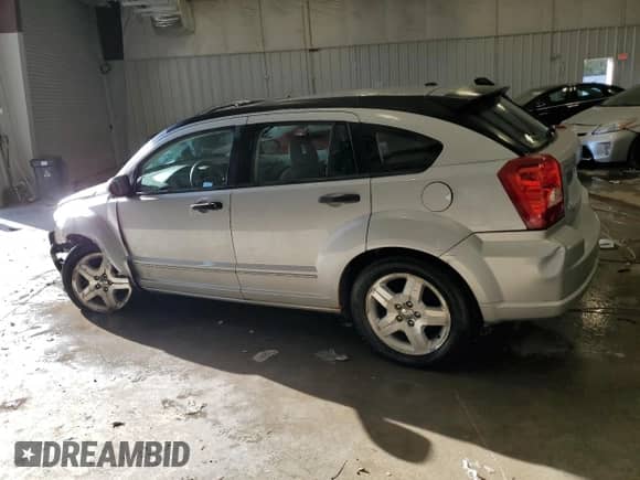 2007 Dodge Caliber SXT с VIN 1B3HB48B47D125856, выставлен на аукционе Copart как лот 76956114 с пробегом 147 160 миль миль и На запчасти • Non repairable. История ставок и продаж доступна на DreamBid. Изображение 2.