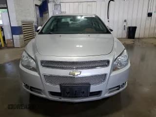 ✅ 2009 Chevrolet Malibu LTZ • VIN: 1G1ZK57709F168936 • Lot: 61315784. Listed on Copart with 186,829 mi. Free auction sales archive from the USA and detailed vehicle history report at DreamBid. Image 5.