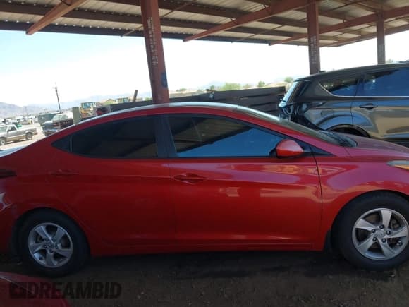 ✅ 2015 Hyundai Elantra SE • VIN: KMHDH4AE2FU458891 • Lot: 42821027. Listed on IAAI with 127,669 mi. Free auction sales archive from the USA and detailed vehicle history report at DreamBid. Image 13.