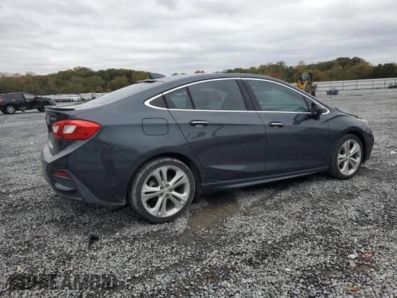 ✅ 2017 Chevrolet Cruze Premier • VIN: 1G1BF5SM3H7184883 • Lot: 89847285. Listed on Copart with 136,018 mi. Free auction sales archive from the USA and detailed vehicle history report at DreamBid. Image 3.