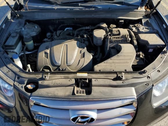 ✅ 2012 Hyundai Santa Fe Limited • VIN: 5XYZKDAG1CG159080 • Lot: 82495254. Listed on Copart with 174,813 mi. Free auction sales archive from the USA and detailed vehicle history report at DreamBid. Image 12.