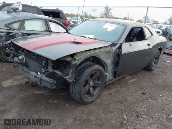✅ 2013 Dodge Challenger SXT • VIN: 2C3CDYAG0DH665966 • Lot: 43543054. Listed on IAAI with 128,859 mi. Free auction sales archive from the USA and detailed vehicle history report at DreamBid. Image 2.