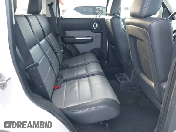 2008 Dodge Nitro SLT z VIN 1D8GT58K68W288772, wystawiony jako IAAI lot #41621789 z przebiegiem 187 410 mil mil oraz . Historia ofert i sprzedaży dostępna na DreamBid. Obrazek 8.