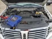 ✅ 2015 Lincoln Navigator • VIN: 5LMJJ3JT2FEJ14453 • Lot: 58723115. Listed on Copart with 154,651 mi. Free auction sales archive from the USA and detailed vehicle history report at DreamBid. Image 12.