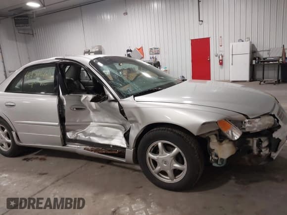✅ 2002 Buick Regal LS • VIN: 2G4WB52K821171470 • Lot: 41954621. Listed on IAAI with Not provided. Free auction sales archive from the USA and detailed vehicle history report at DreamBid. Image 6.