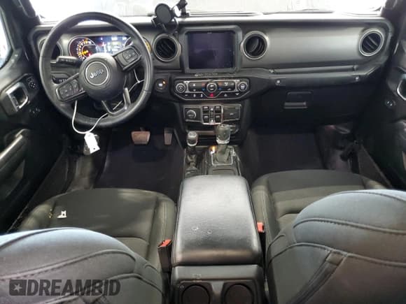 ✅ 2022 Jeep Gladiator Texas Trail • VIN: 1C6HJTAG7NL134613 • Лот: 70038155. Опубликован ранее на Copart с пробегом 52 438 миль. Бесплатный доступ к архиву аукционных продаж из США и подробный отчёт об истории автомобиля на DreamBid. Изображение 8.