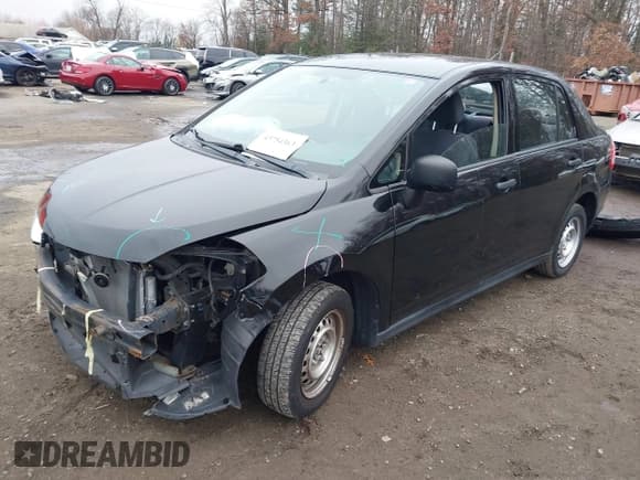 ✅ 2009 Nissan Versa 1.6 • VIN: 3N1CC11EX9L458233 • Lot: 43754363. Listed on IAAI with 148,298 mi. Free auction sales archive from the USA and detailed vehicle history report at DreamBid. Image 2.