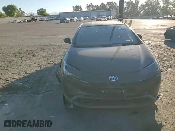 2025 Toyota Prius LE с VIN JTDACAAU8S3059589, выставлен на аукционе Copart как лот 72100945 с пробегом 14 715 миль миль и Списание • Salvage title. История ставок и продаж доступна на DreamBid. Изображение 15.