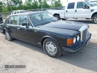✅ 1994 Bentley Turbo R • VIN: SCBZP03C0RCX54166 • Lot: 42310238. Wystawiony na IAAI z przebiegiem 59 887 mil. Bezpłatny archiwum sprzedaży aukcyjnych z USA i szczegółowy raport historii pojazdu na DreamBid. Zdjęcie 1.