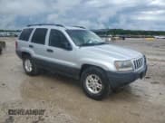 ✅ 2004 Jeep Grand Cherokee Laredo • VIN: 1J4GW48S64C140353 • Lot: 59335125. Listed on Copart with 131,847 mi. Free auction sales archive from the USA and detailed vehicle history report at DreamBid. Image 4.