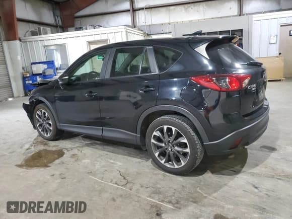 ✅ 2016 Mazda CX-5 Grand Touring • VIN: JM3KE4DYXG0834277 • Lot: 85742985. Listed on Copart with 102,312 mi. Free auction sales archive from the USA and detailed vehicle history report at DreamBid. Image 2.