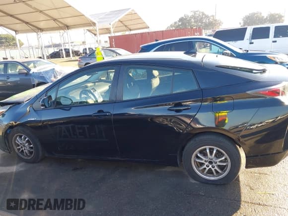 ✅ 2017 Toyota Prius Two • VIN: JTDKBRFU7H3035565 • Lot: 43656486. Listed on IAAI with 152,690 mi. Free auction sales archive from the USA and detailed vehicle history report at DreamBid. Image 14.